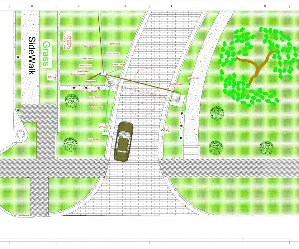 Diagram of a vehicle access point with sidewalks, grass areas, and conduit locations.